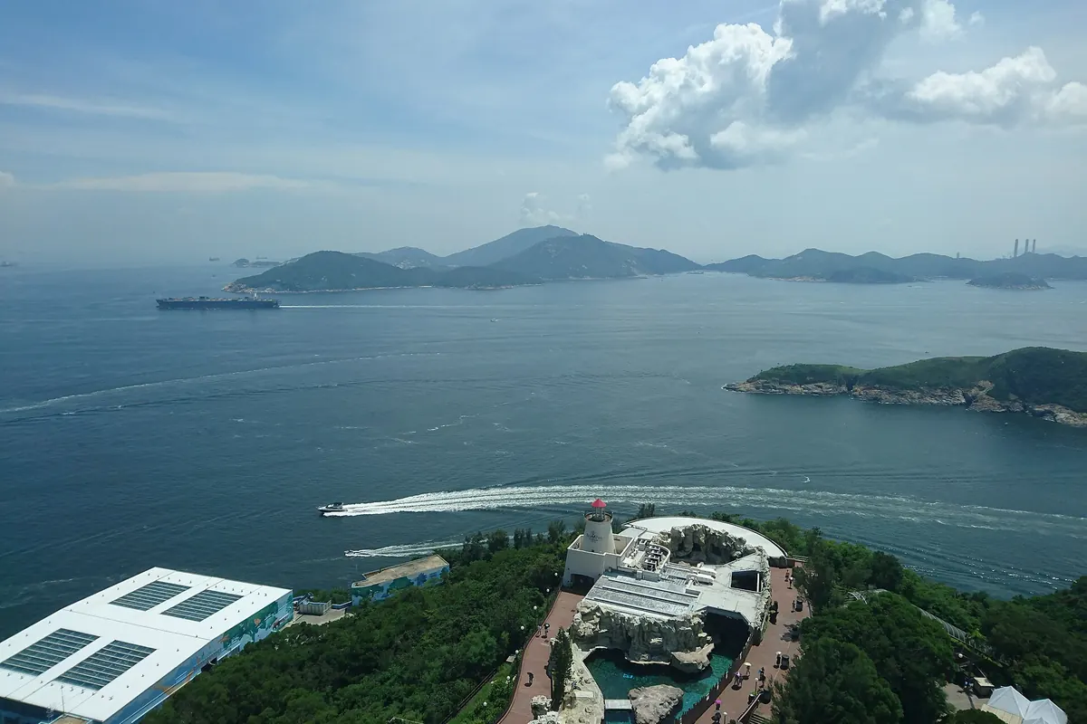 A view across the sea to green islands from a high point in the park